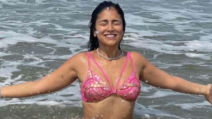 Shriya Saran raises temperature in pink bikini, drops hot photos from Goa