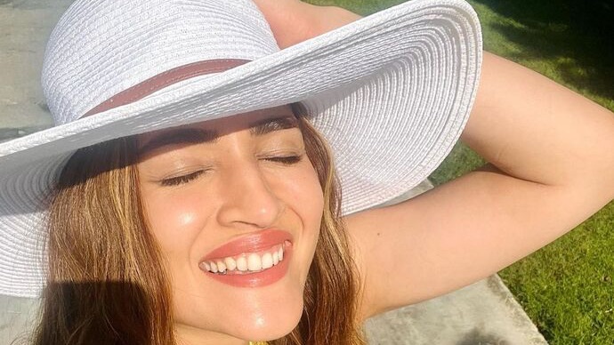 Kriti Sanon shares her sun-kissed photos in a floral bikini and white shorts to kick off 2023 on a bright note